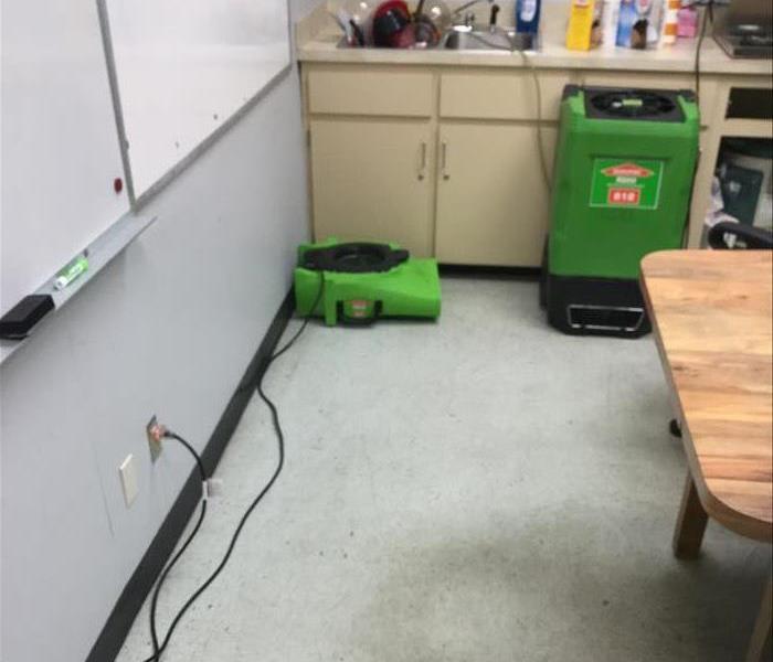 green drying gear  gray tile, blackboards, and sink