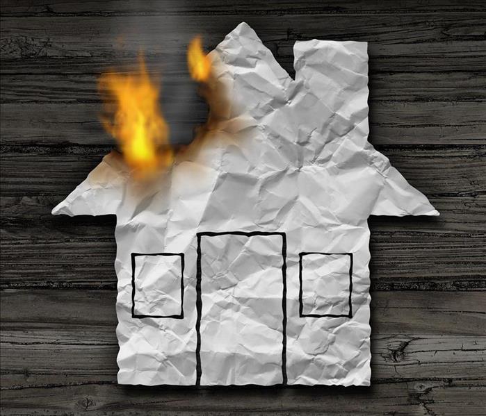 Concepto de incendio de la casa y símbolo de destrucción ardiente como una ilustración 3D en madera rústica